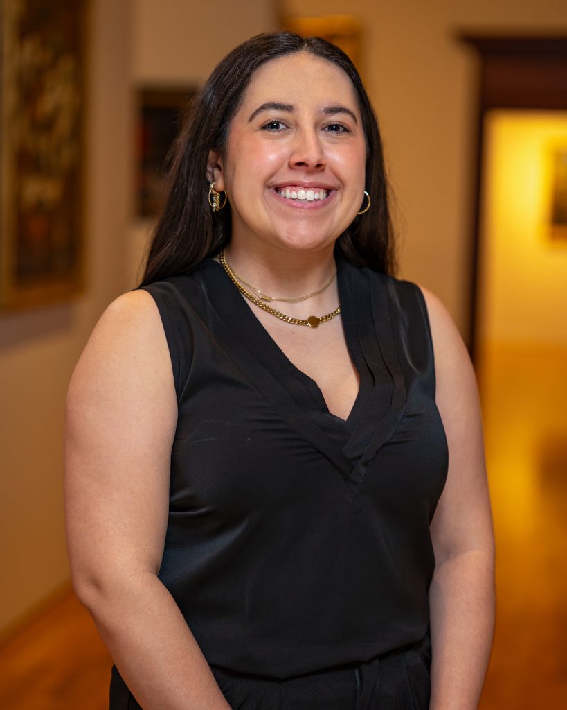 Brianna Guilherme in a black shirt with a necklace