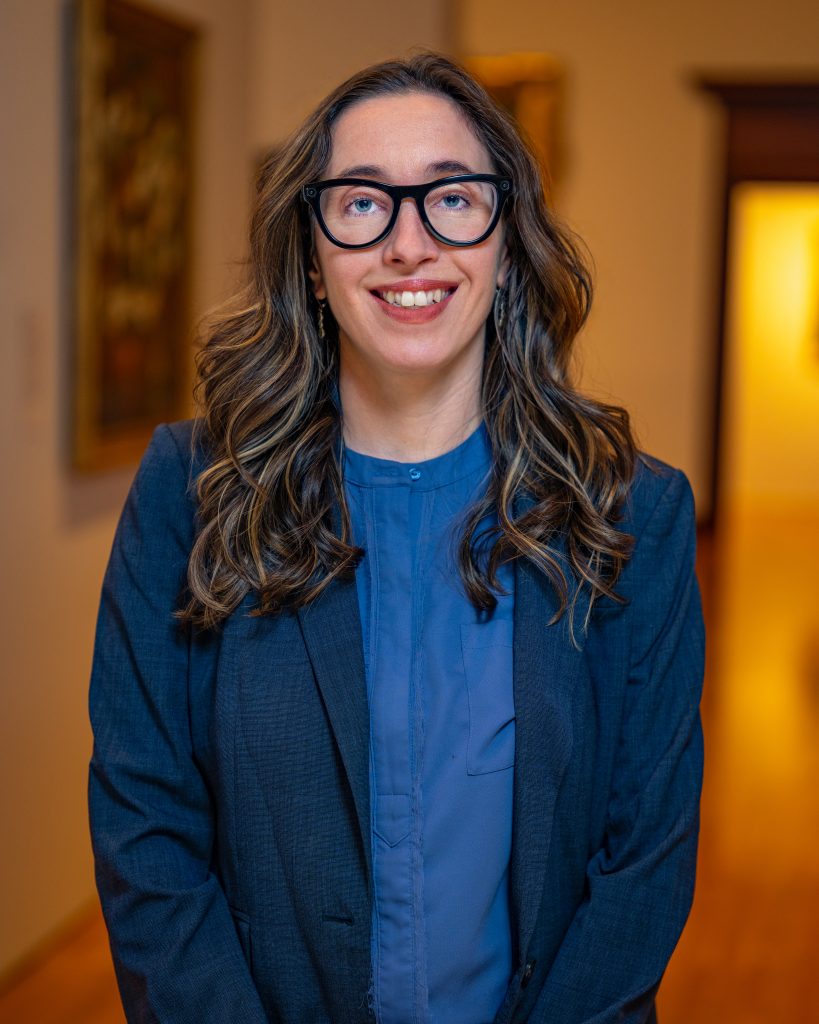 Tanya Labeck with glasses and blue shirt and blue jacket